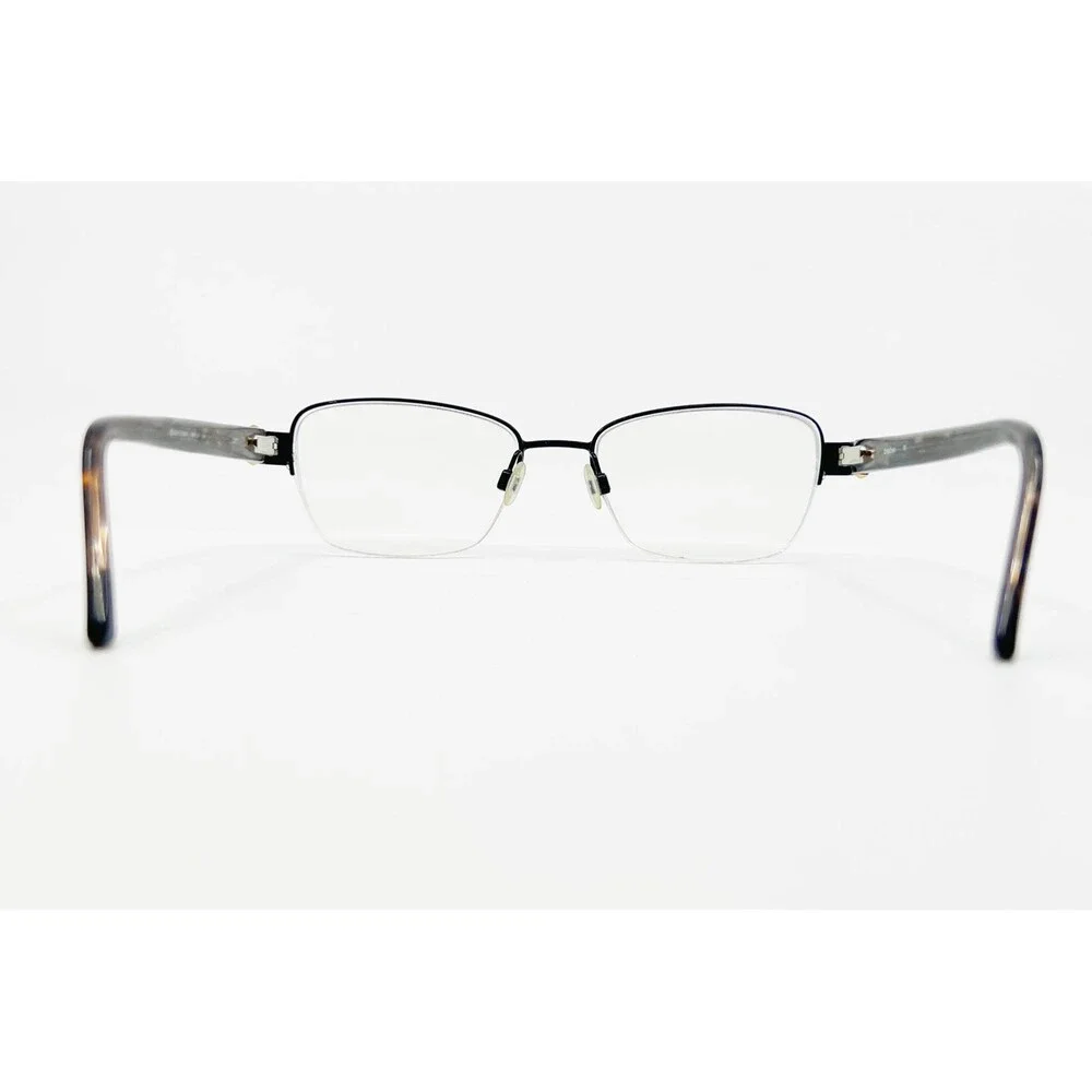 Bebe Eyeglasses Womens Black Semi-Rimless Tough Cookie BB5127 52-16-135
